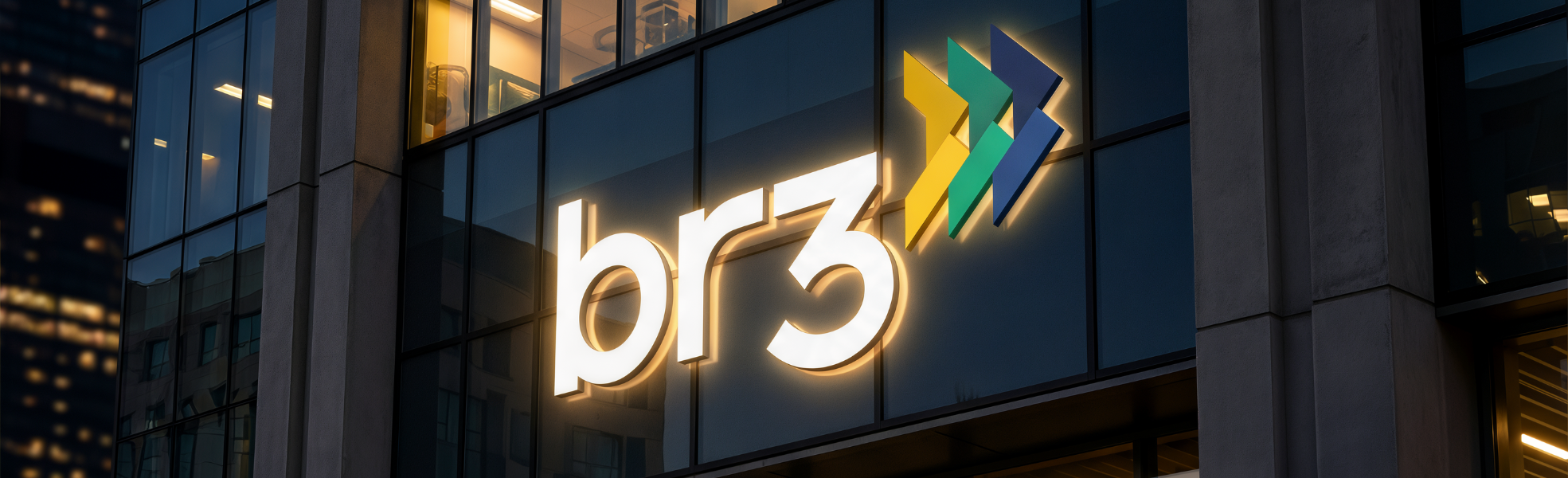 Fachada corporativa da BR3 iluminada em ambiente noturno